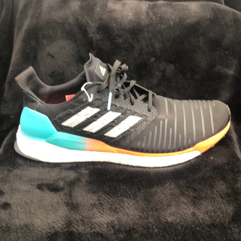 Brand new Adidas solar boost size 14